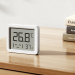 Compact Xiaomi Smart Temperature and Humidity Monitor 3 Mini in a modern home