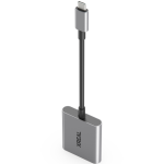 XREAL Hub connected to a compatible gaming handheld and XREAL AR glasses for charging during gameplay